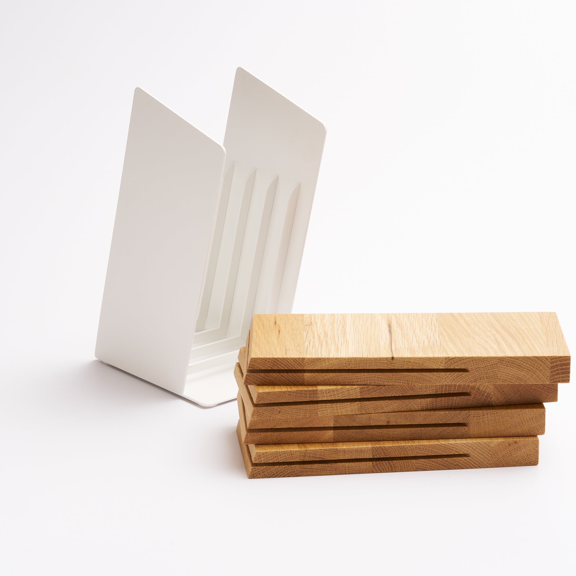 Universal knife block with wood blocks removed to show functionality and ability to easily clean. Designed by Apto. 