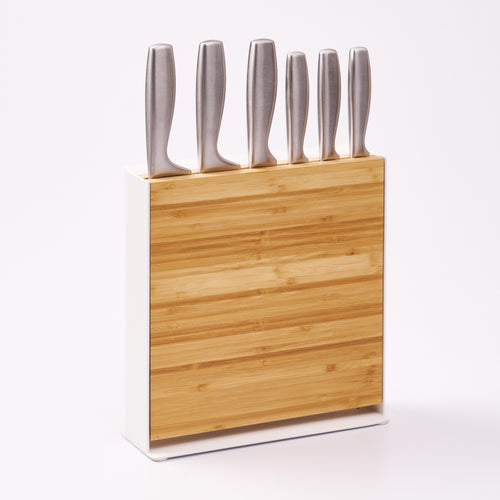 Universal knife holder from Apto with bamboo removable cutting board. Designed by Apto. 