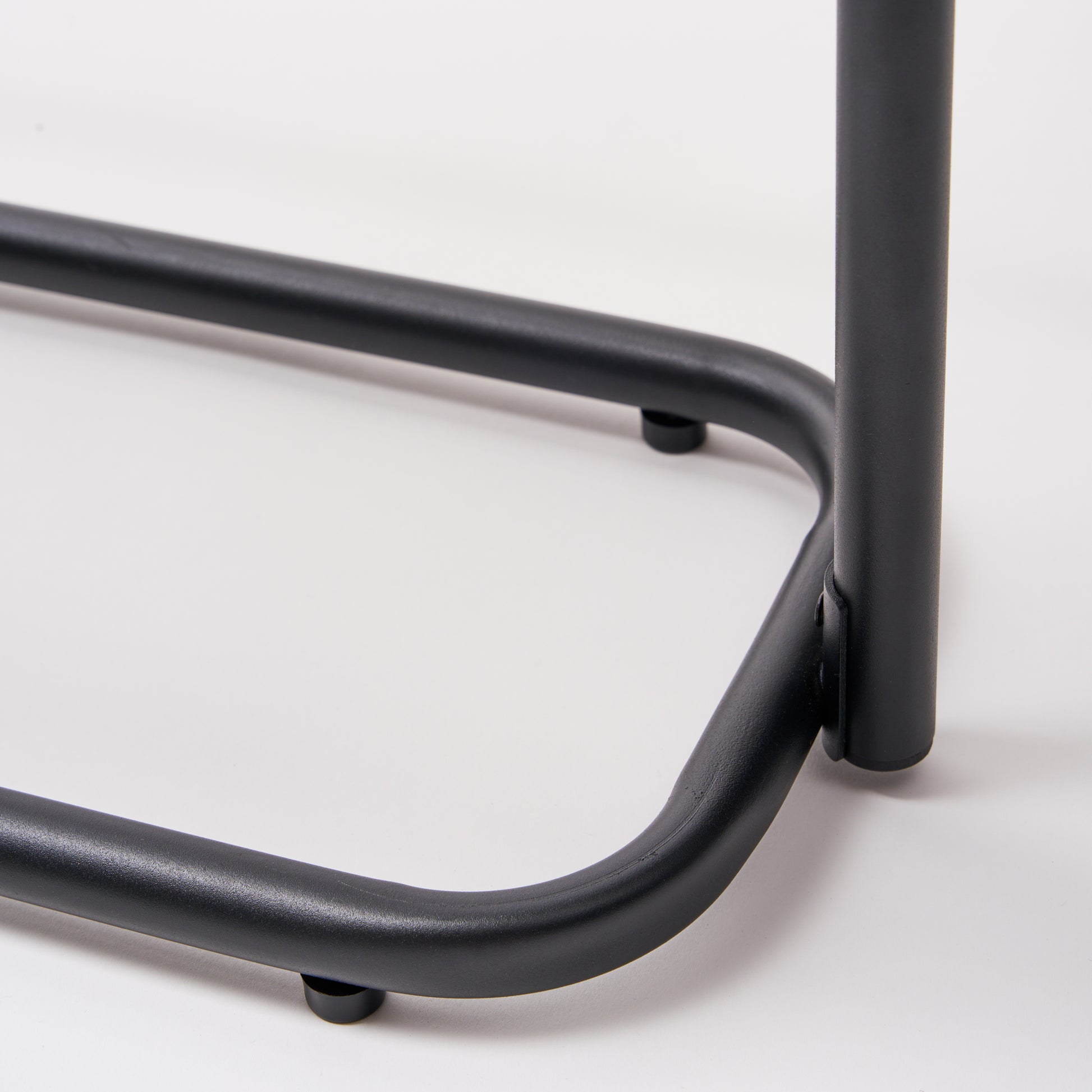 Close-up of Obround Shoe Rack - Tall showing the bottom