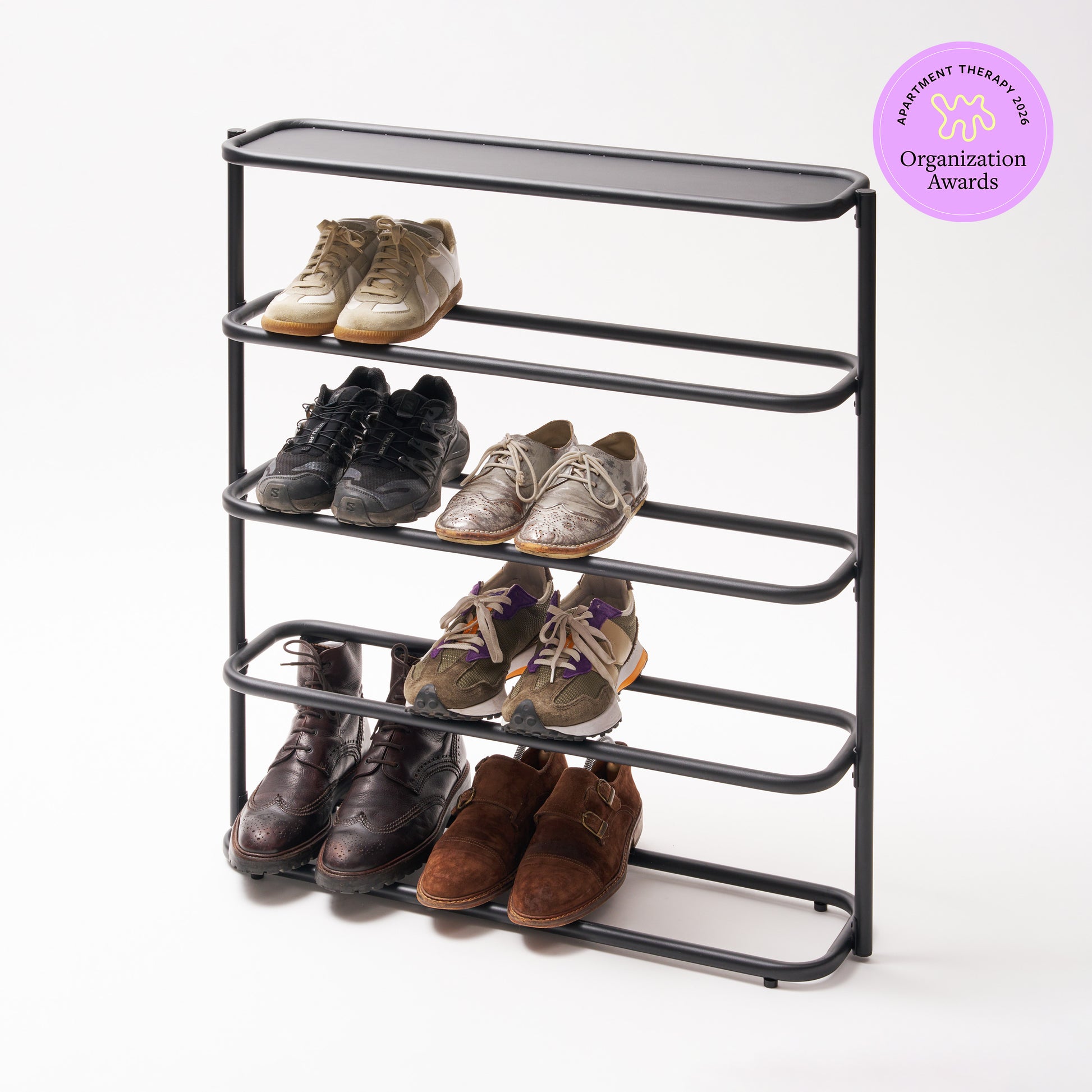 Black Obround Shoe Rack - Tall holding 6 pairs of shoes with a 2026 Apartment Therapy Organization Awards logo on the top right.
