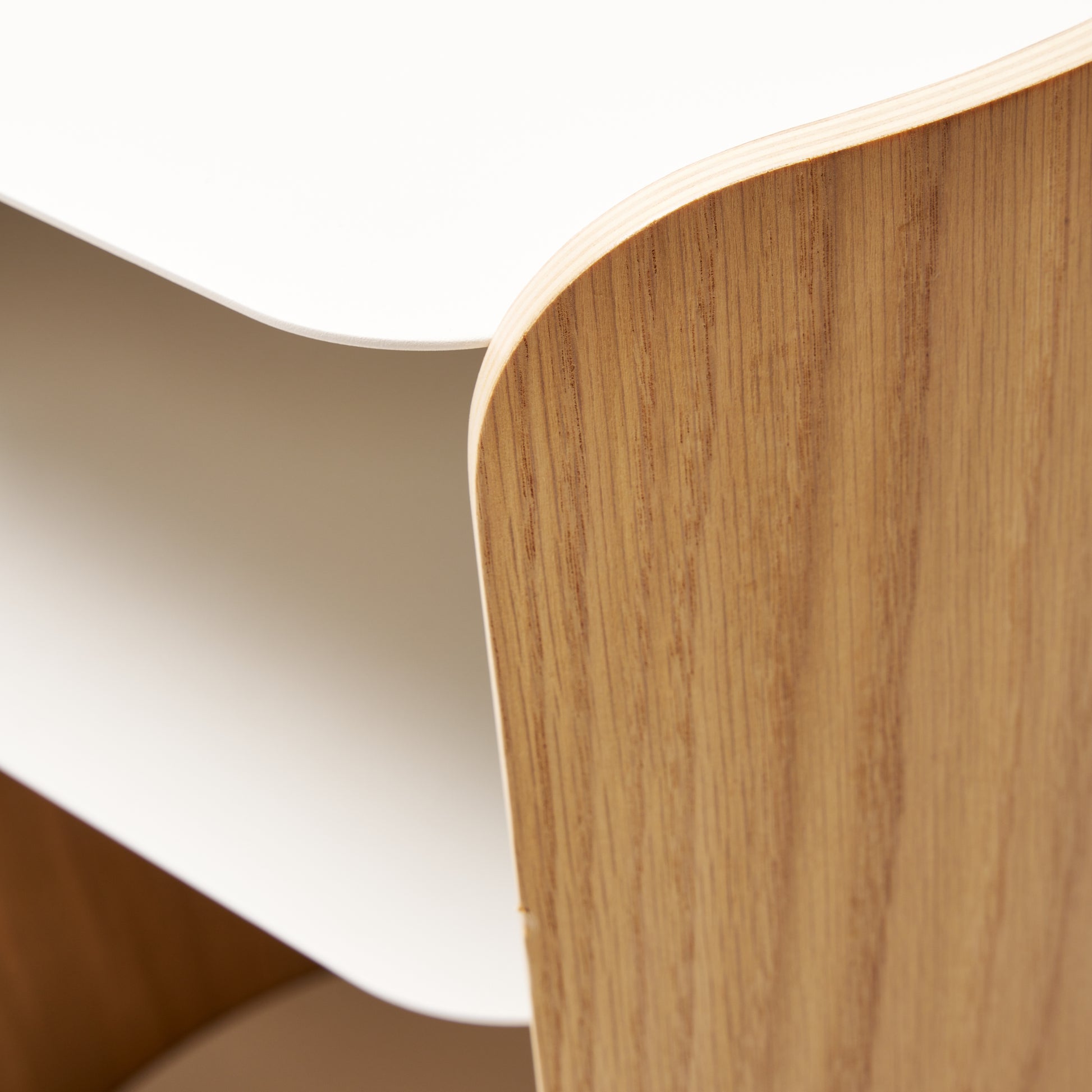 Close-up of Contour Side Table in White showing the side