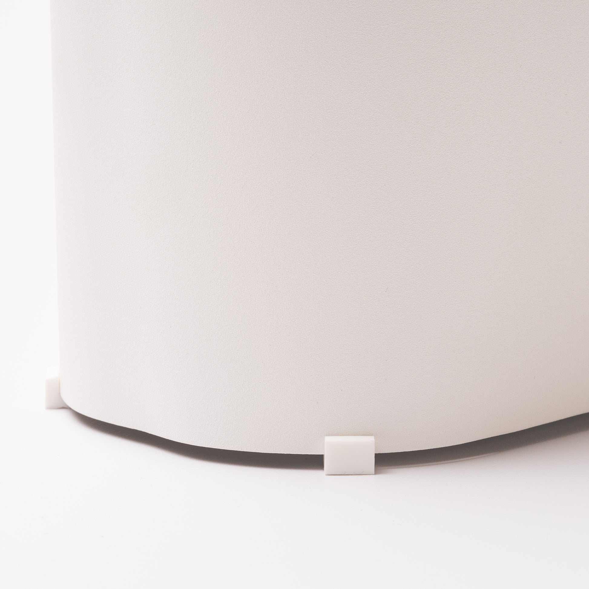 Close-up of Sloped Utensil Holder showing rubber feet