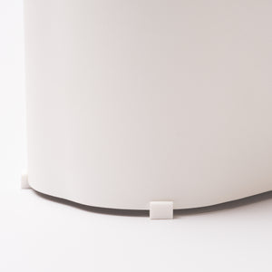 Close-up of Sloped Utensil Holder showing rubber feet