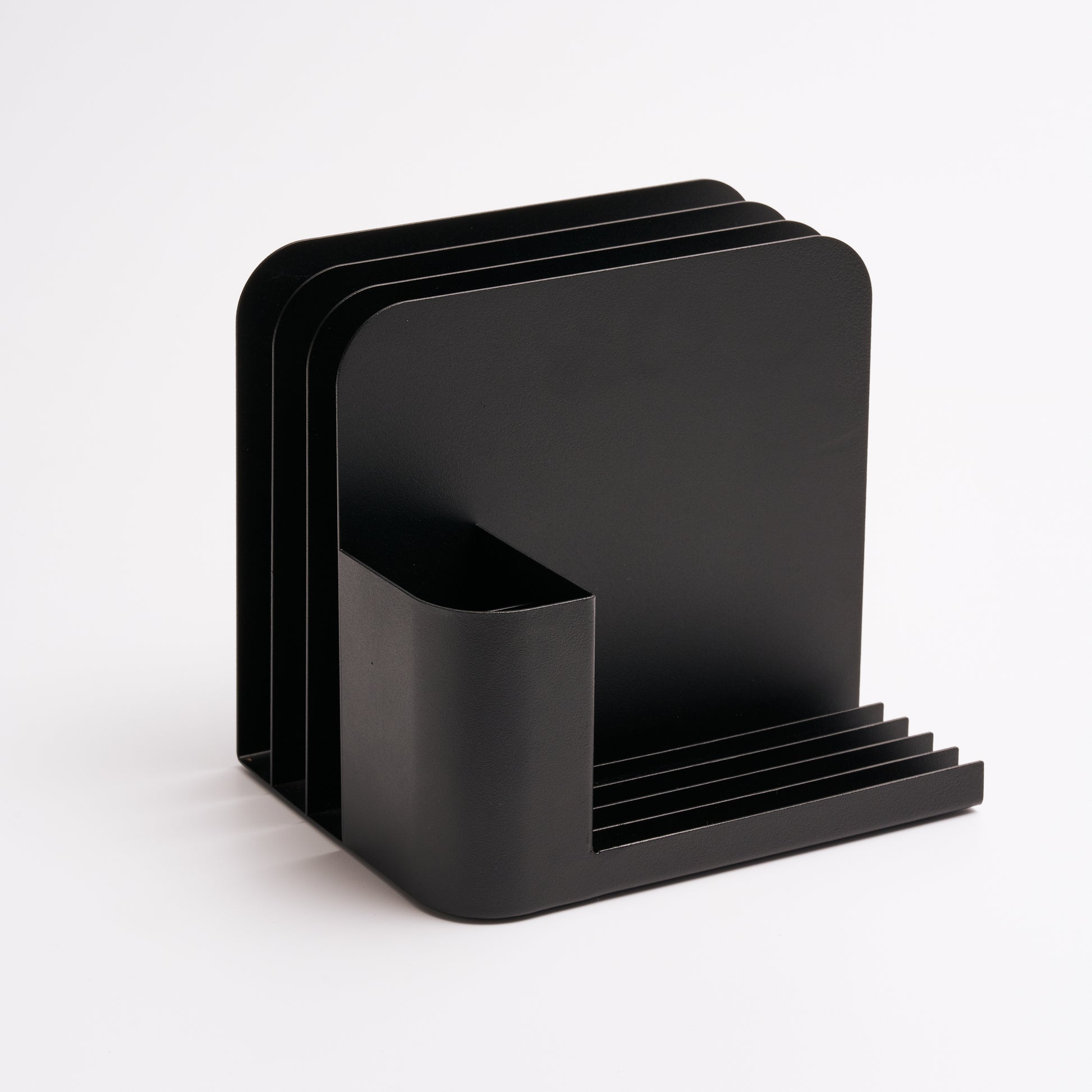 Black steel desk caddy without any supplies, designed from Apto. 