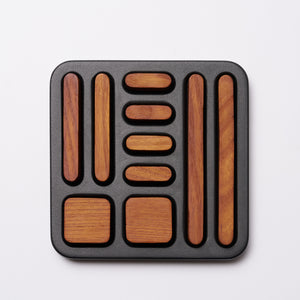 Tidy magnet set with all magnets stored in holder