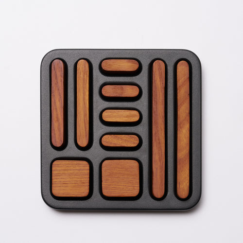 Tidy magnet set with all magnets stored in holder
