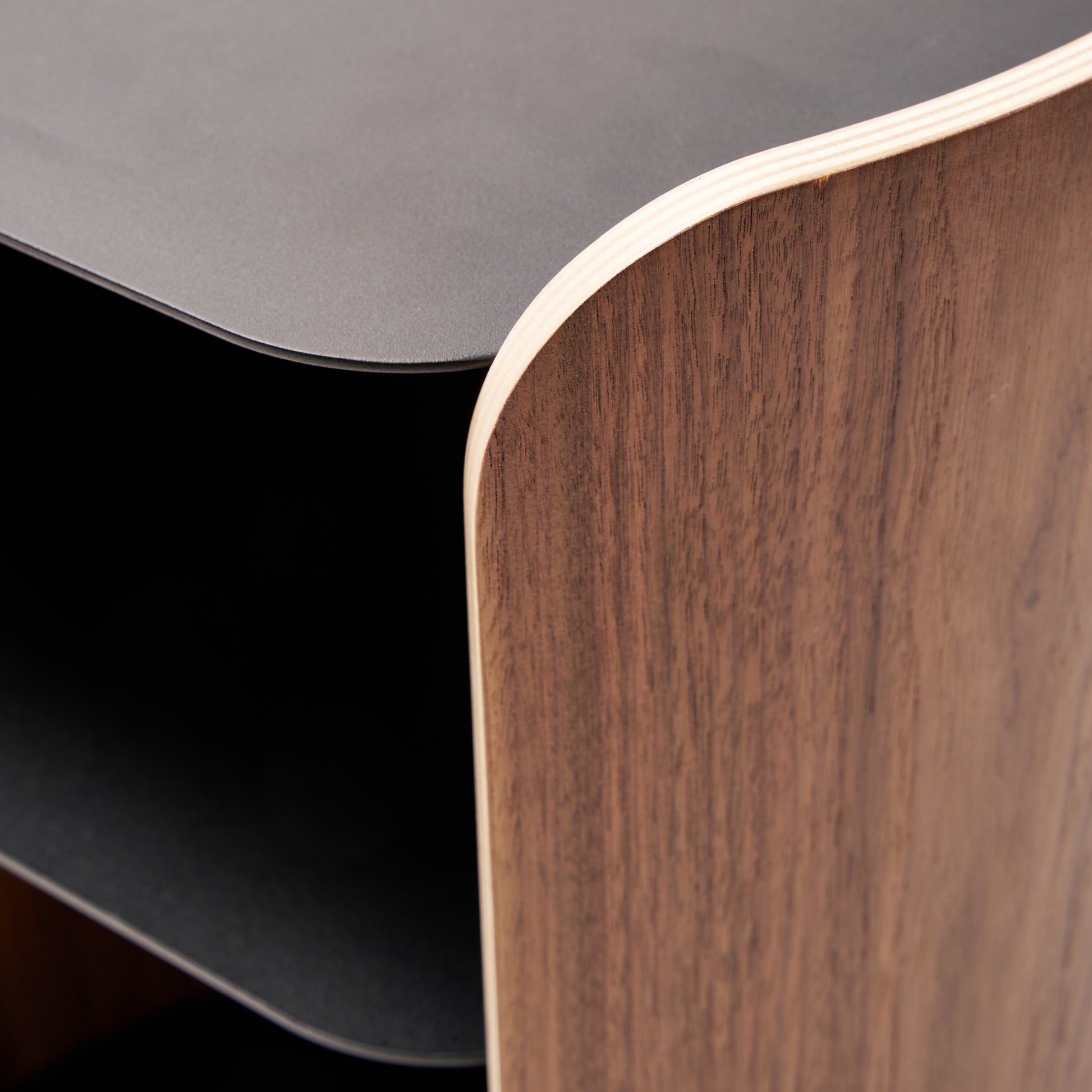 Close-up of Contour Side Table in Black showing the side