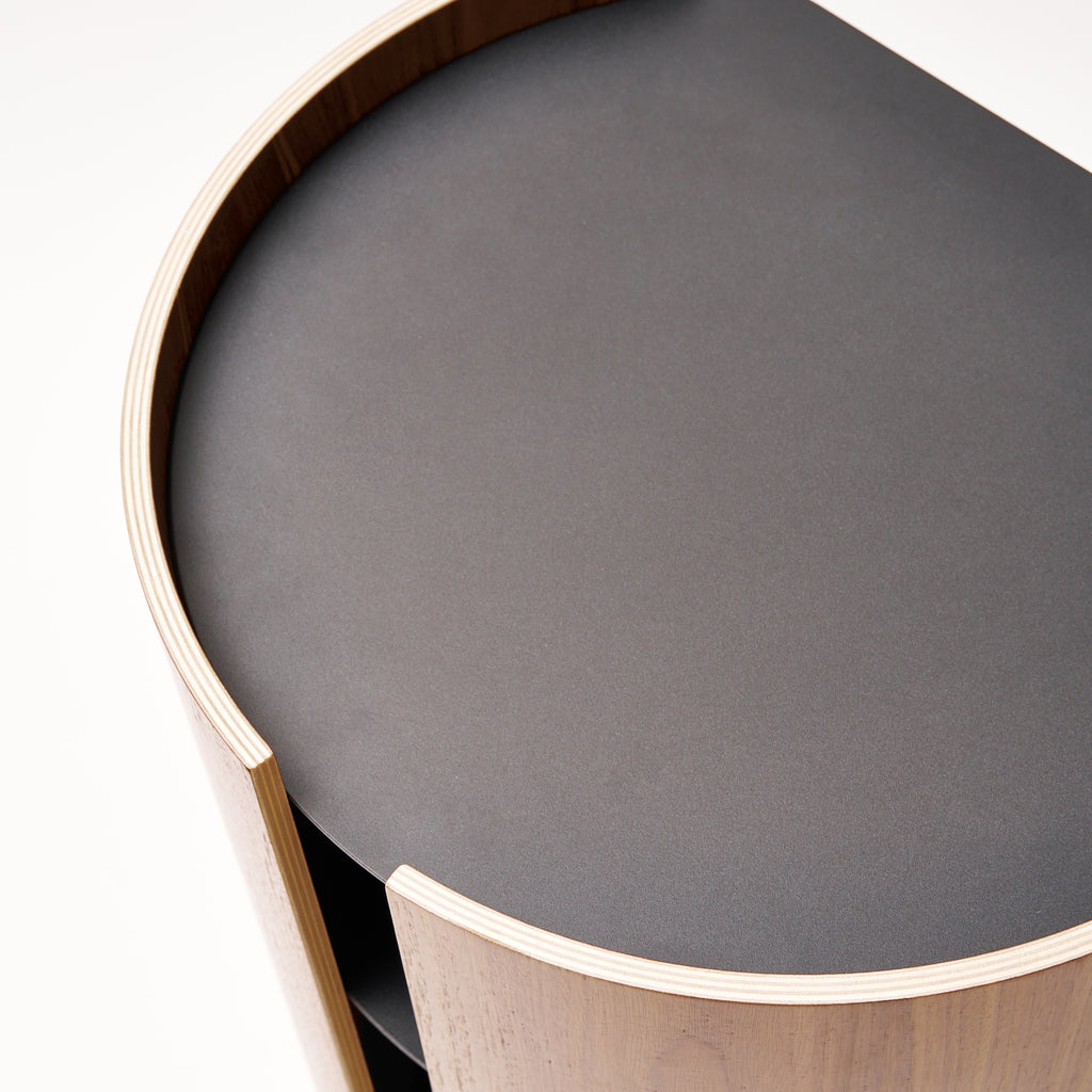 Close-up of Contour Side Table in Black showing the top