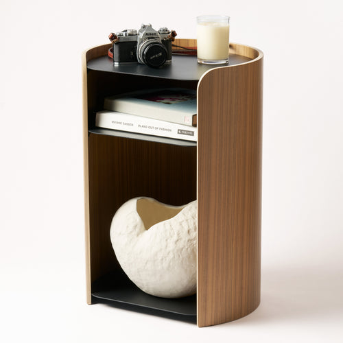 Contour Side Table - Steel + Wood in Black with various props against a white background